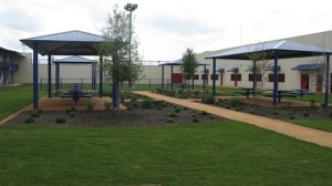 The Karnes County Civil Detention Center in Texas has outdoor spaces and other features meant to make immigrant detention less like prison. It will house mostly low-risk, nonviolent offenders. 